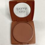 polvo bronceador 97