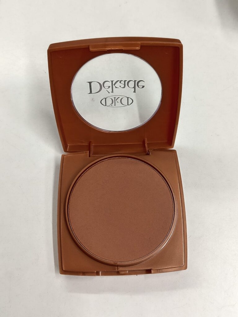 polvo bronceador 97